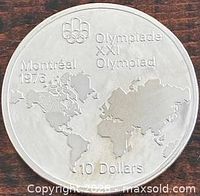 Reverse side of the 1973 Canada $10 silver Olympic map coin