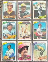 Front view of all nine cards in plastic sheet