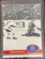 Front of Paul Henderson card showing action photo and border