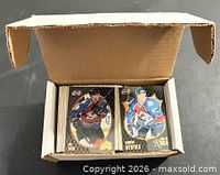 Open box showing two stacks of 1996-97 Pinnacle Summit hockey cards