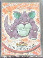 Front of Nidoking card showing artwork and card number 34