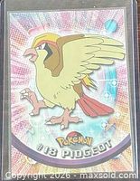 Front of #18 Pidgeot Topps Pokémon card in sleeve
