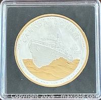Reverse of 2010 Canadian Navy proof dollar in capsule