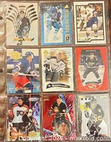 Front view of all nine cards in sleeve