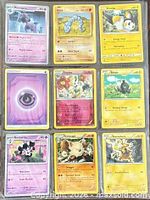 Front view of all nine Pokémon cards in a 3×3 layout