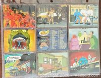 Front view of nine The Tick trading cards in plastic sheet