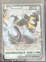 Front view of Melmetal V card in sleeve showing artwork, stats, set number.
