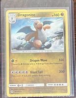 Front of Dragonite #96/149 card showing artwork, stats, and condition in sleeve