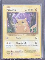 Front of Pikachu XY Evolutions card showing artwork, HP, attacks, and sleeve