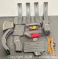 Entire lot showing all track sections, car, controller and accessories
