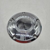 front view of chrome derby cover with anniversary engraving