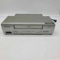 Front view of Emerson EWV430 4-head VHS VCR with power cord
