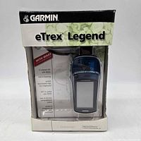 Front view of boxed Garmin eTrex Legend showing unit and branding