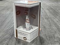 Front three-quarter view of boxed GloPRO Lip Edition tool