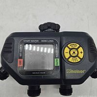 Front view showing LCD screen, control panel and manual dial