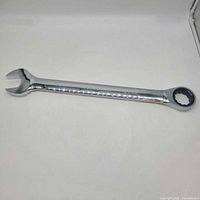 Full view of wrench showing both open and ratcheting ends