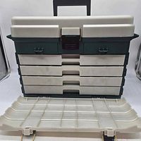 Front view closed showing drawers and latch