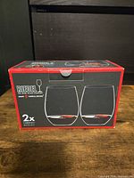 Box displaying image of two Riedel Cabernet/Merlot stemless wine glasses and product details