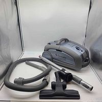 Canister vacuum with hose, wand, attachments