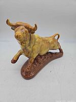Front angle showing full bull figurine and glaze colors