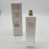 Front view showing bottle label and sealed box