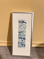 Frontal view of framed etching showing artwork, mat, and frame