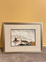 Front view of framed watercolor lighthouse print