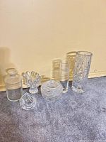 Group shot of all six clear glass pieces