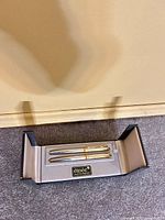 Closed presentation box displaying two writing instruments