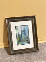 Framed artwork front view showing full piece and frame