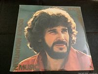 Front cover of sealed Eddie Rabbitt Rocky Mountain Music LP