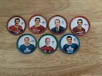Front view of all seven Shirriff hockey coins