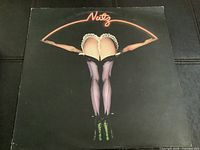 Front album cover showing artwork and title