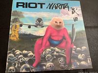 Front cover showing album art and title