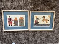 Both framed papercuts side by side showing full lot