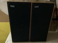 Front view of both Epicure speakers with grilles installed