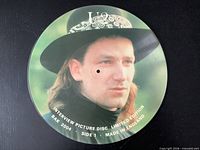 Side 1 of the U2 Bono picture disc showing portrait image and text details