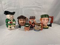Group shot of all five character jugs