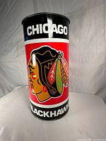 Full view of metal Chicago Blackhawks waste bin showing team logo and colors