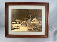 Front view of framed gold foil print