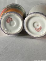 Bottoms of both vases showing Chikaramachi marks