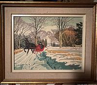 Full view of framed oil painting showing winter sleigh scene