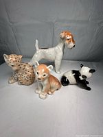Group shot of all four USSR porcelain animal figurines
