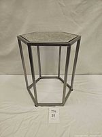 Front view showing full hexagonal table and frame