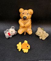 Group shot of all four pins: large dough teddy, dough goldfish, two flocked teddy bears
