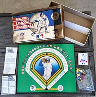 overall view with box, board, pieces and paperwork