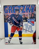 Front view of plaque showing full image and graphics