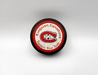 Face showing Kingston Canadians red-white label