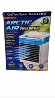 Front of retail box showing Arctic Air Pure Chill MAX personal air cooler