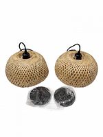 two bamboo wicker pendant lights with cords and packaged canopies